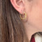 Boucles d'oreilles Créoles torsadées en or 18k 58 Facettes