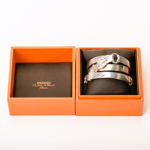 HERMES_Brazalete rígido Débridée en plata_estuche.jpg