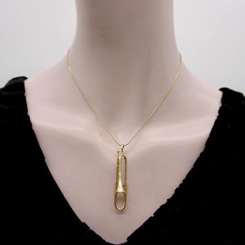 Pendentif Pendentif trombone mécanique en or 14K 58 Facettes 11149