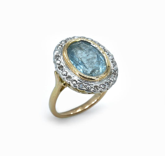 foto av ring i gult guld med akvamarin och diamanter.jpg