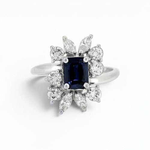 https://cdn.shopify.com/s/files/1/1015/8633/8124/files/vintage-modernist-18k-gold-daisy-sapphire-diamond-ring-front.jpg?v=1782640650