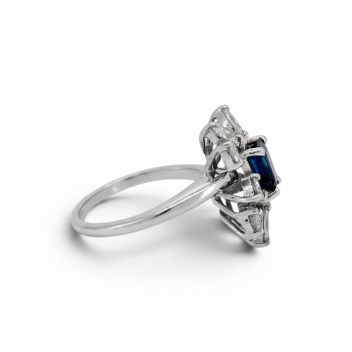 https://cdn.shopify.com/s/files/1/1015/8633/8124/files/vintage-modernist-18k-gold-daisy-sapphire-diamond-ring-right-band.jpg?v=1782640752