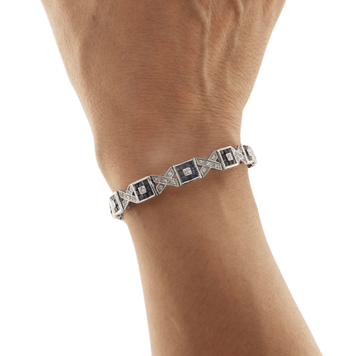 Bracelet Bracelet en or blanc avec diamants et saphirs 58 Facettes G3979