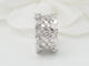 Bague 50 INEDT Op'art - Bague ajourée en or blanc et diamants 58 Facettes 33437