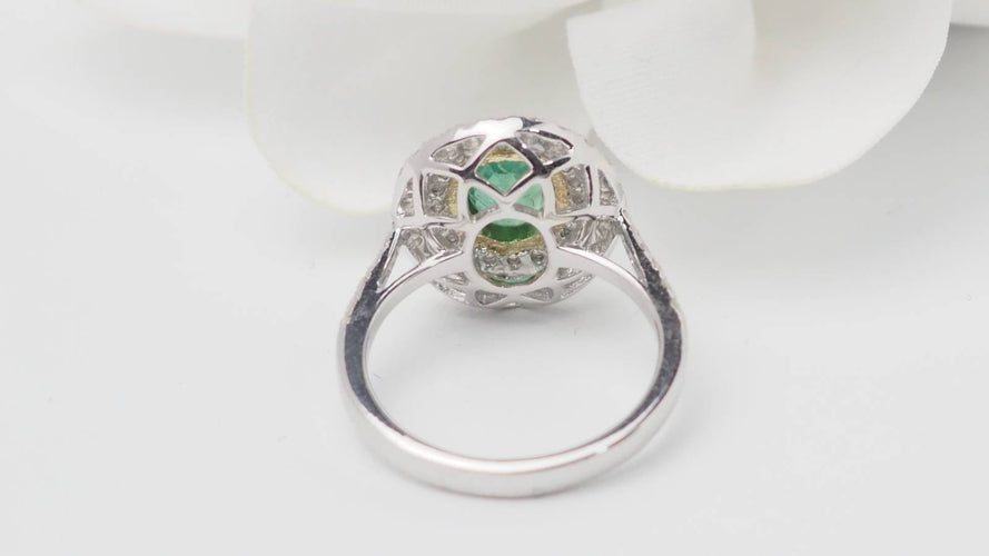 Bague 54 Bague double entourage en or bicolore, émeraude et diamants 58 Facettes 32849