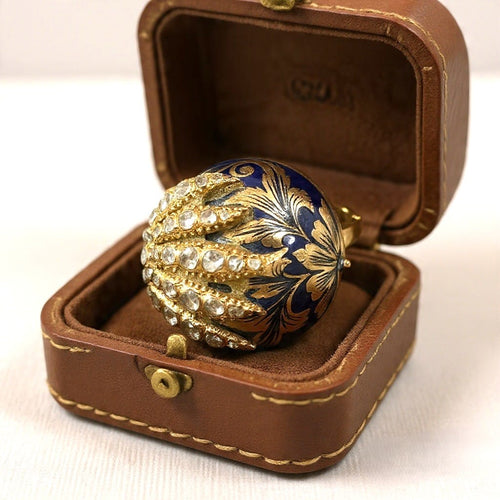 place-this-ornate-antique-gold-and-blue-enamel-rin.jpg