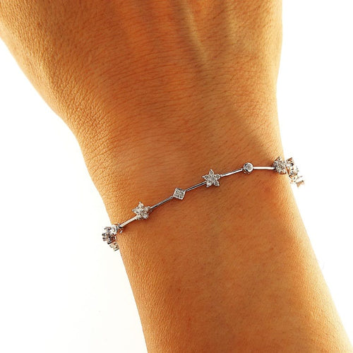 https://www.gioielleriaguidetti.it/wp-content/uploads/2026/07/G3984-bracciale-oro-bianco-diamanti-brillanti-3.jpg