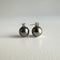grey-tahitian-pearl-diamond-earrings-18k-white-gold-underwater-5.jpg