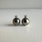 grey-tahitian-pearl-diamond-earrings-18k-white-gold-underwater-4.jpg