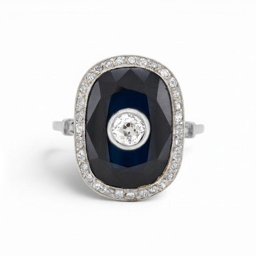 https://cdn.shopify.com/s/files/1/1015/8633/8124/files/antique-art-deco-platinum-sapphire-cocktail-diamond-halo-ring-front.jpg?v=1783330016