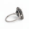 https://cdn.shopify.com/s/files/1/1015/8633/8124/files/antique-art-deco-platinum-sapphire-cocktail-diamond-halo-ring-right.jpg?v=1783330072
