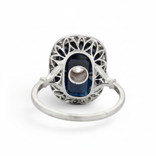 https://cdn.shopify.com/s/files/1/1015/8633/8124/files/antique-art-deco-platinum-sapphire-cocktail-diamond-halo-ring-back.jpg?v=1783330091