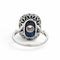 https://cdn.shopify.com/s/files/1/1015/8633/8124/files/antique-art-deco-platinum-sapphire-cocktail-diamond-halo-ring-back.jpg?v=1783330091