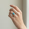 https://cdn.shopify.com/s/files/1/1015/8633/8124/files/antique-victorian-18k-gold-turquoise-diamond-halo-ring-worn.jpg?v=1783331309