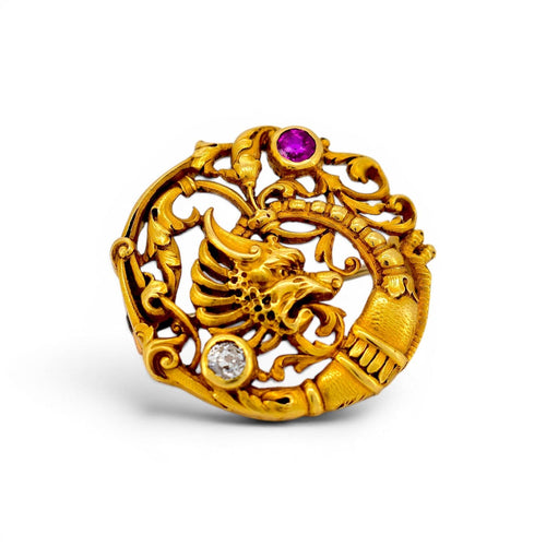 https://cdn.shopify.com/s/files/1/1015/8633/8124/files/DSC_0072_fd928245-antique-art-nouveau-18k-gold-chimera-brooch-ruby-diamond-front-4401-bac9-209c4eac71cd.jpg?v=1783333337