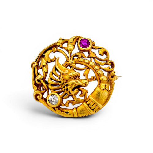https://cdn.shopify.com/s/files/1/1015/8633/8124/files/antique-art-nouveau-18k-gold-chimera-brooch-ruby-diamond-top.jpg?v=1783333433