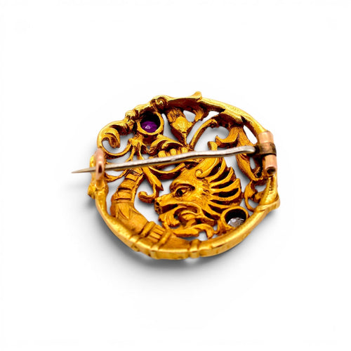 https://cdn.shopify.com/s/files/1/1015/8633/8124/files/antique-art-nouveau-18k-gold-chimera-brooch-ruby-diamond-detail.jpg?v=1783333561