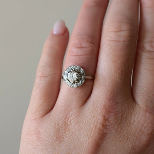 https://cdn.shopify.com/s/files/1/1015/8633/8124/files/antique-art-deco-white-gold-platinum-diamond-halo-ring-stone-detail_8dd8c89c-2ae3-4c89-aa4d-3232cb63a408.jpg?v=1783338589