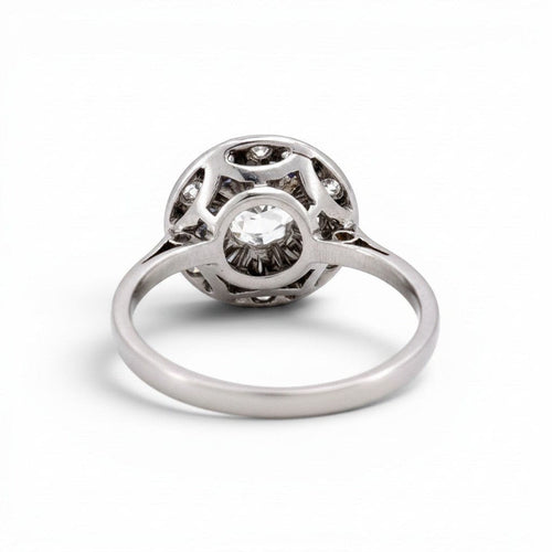 https://cdn.shopify.com/s/files/1/1015/8633/8124/files/antique-art-deco-white-gold-platinum-diamond-halo-ring-back_d149b942-9c15-4510-9892-36e9d6219612.jpg?v=1783338589