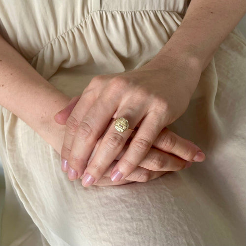 Augis_Ring + than yesterday - than tomorrow yellow gold small model_worn.jpeg
