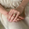 Augis_Ring + than yesterday - than tomorrow yellow gold small model_worn.jpeg