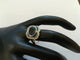 Bague 53.5 Bague marguerite en or blanc, saphir, émeraudes et diamants 58 Facettes 00946