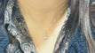 Collier Collier solitaire en or jaune et topaze bleue 58 Facettes XLAA0052
