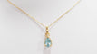 Collier Collier solitaire en or jaune et topaze bleue 58 Facettes XLAA0052