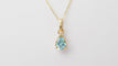 Collier Collier solitaire en or jaune et topaze bleue 58 Facettes XLAA0052