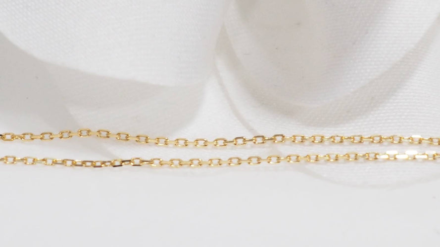 Collier Collier solitaire en or jaune et topaze bleue 58 Facettes XLAA0052