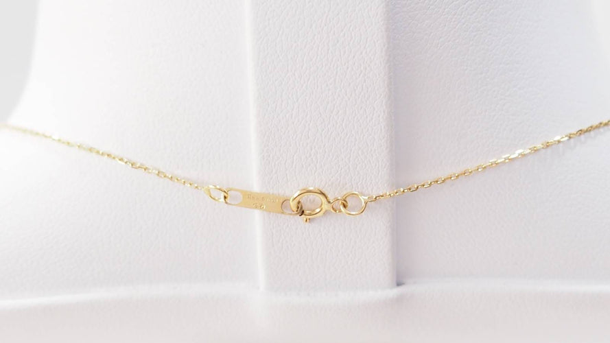 Collier Collier solitaire en or jaune et topaze bleue 58 Facettes XLAA0052