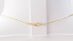 Collier Collier solitaire en or jaune et topaze bleue 58 Facettes XLAA0052