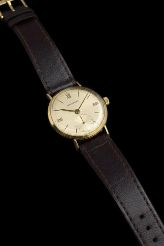 Montre Longines - Montre vintage en or jaune 58 Facettes
