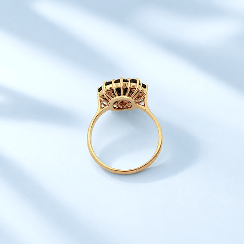 bague-grenat-Marguerit-femme-or-jaune-18-carats-occasion.png