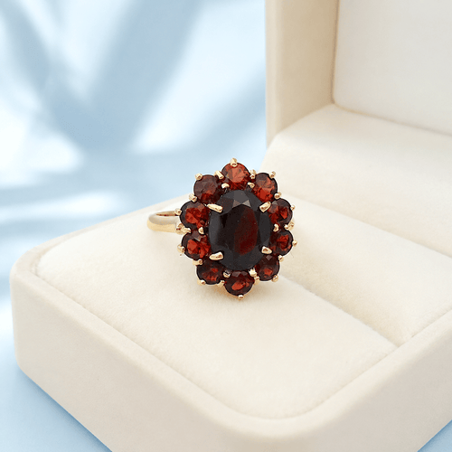 bague-Marguerit-grenat-or-jaune-18-carats.png