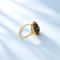 bague-seconde-main-Marguerit-grenat-or-jaune.png