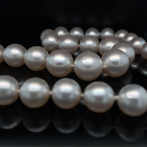 Collier Collier de perles blanches australiennes et diamants en or jaune 58 Facettes