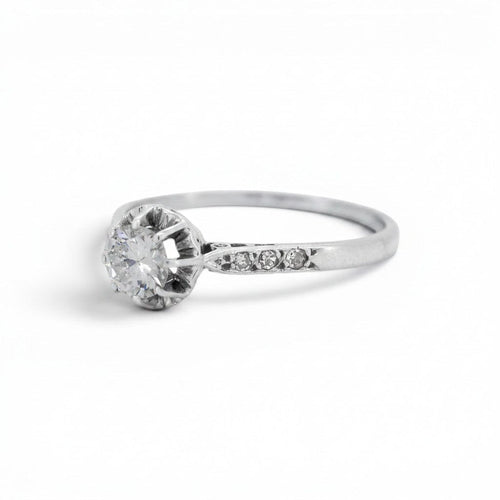 https://cdn.shopify.com/s/files/1/1015/8633/8124/files/antique-art-deco-platinum-Solitaire-old-cut-diamond-ring-left.jpg?v=1783863457