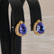 Boucles d'oreilles Boucles d'oreilles en or jaune 18 ct, tanzanites GFCO et diamants 58 Facettes E0033