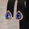 Boucles d'oreilles Boucles d'oreilles en or jaune 18 ct, tanzanites GFCO et diamants 58 Facettes E0033