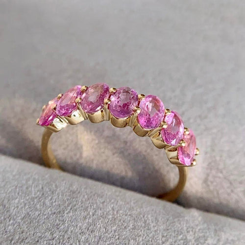 seven-stone-oval-pink-sapphire-ring-18k-gold-5 (1).jpg