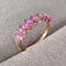 seven-stone-oval-pink-sapphire-ring-18k-gold-4 (1).jpg