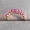 seven-stone-oval-pink-sapphire-ring-18k-gold-3 (1).jpg