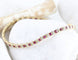 Bracelet vintage en or jaune 18K, rubis et diamants 58 Facettes SC1