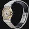 Montre Cartier Santos - Montre ronde octogonale en or jaune et acier 58 Facettes MT47164