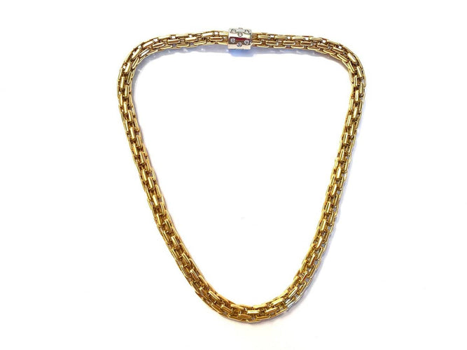 Pomellato - Parure collier et bracelet en or jaune et blanc diamants 58 Facettes Z-PG-263040