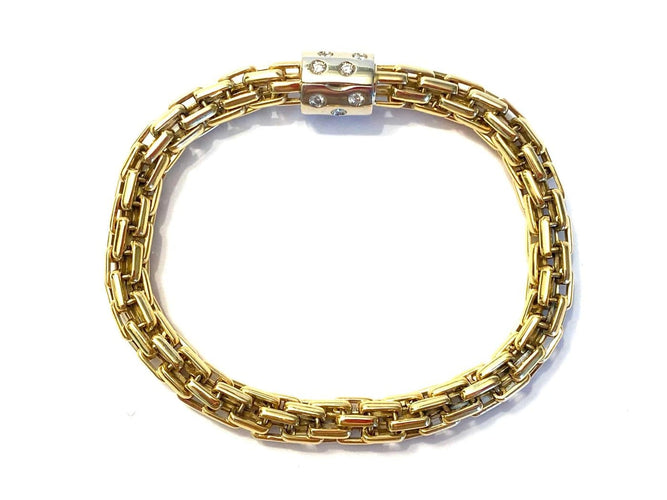 Pomellato - Parure collier et bracelet en or jaune et blanc diamants 58 Facettes Z-PG-263040