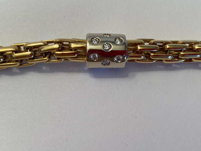 Pomellato - Parure collier et bracelet en or jaune et blanc diamants 58 Facettes Z-PG-263040