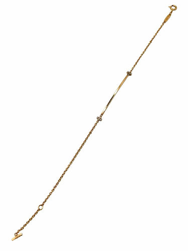 Bracelet Tiffany & Co T - Bracelet en or jaune 18K et diamants 58 Facettes 2134