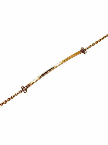 Bracelet Tiffany & Co T - Bracelet en or jaune 18K et diamants 58 Facettes 2134